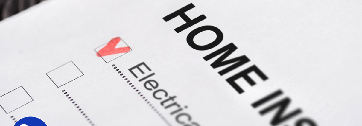 Close-up view of a home inspection checklist marked as checked